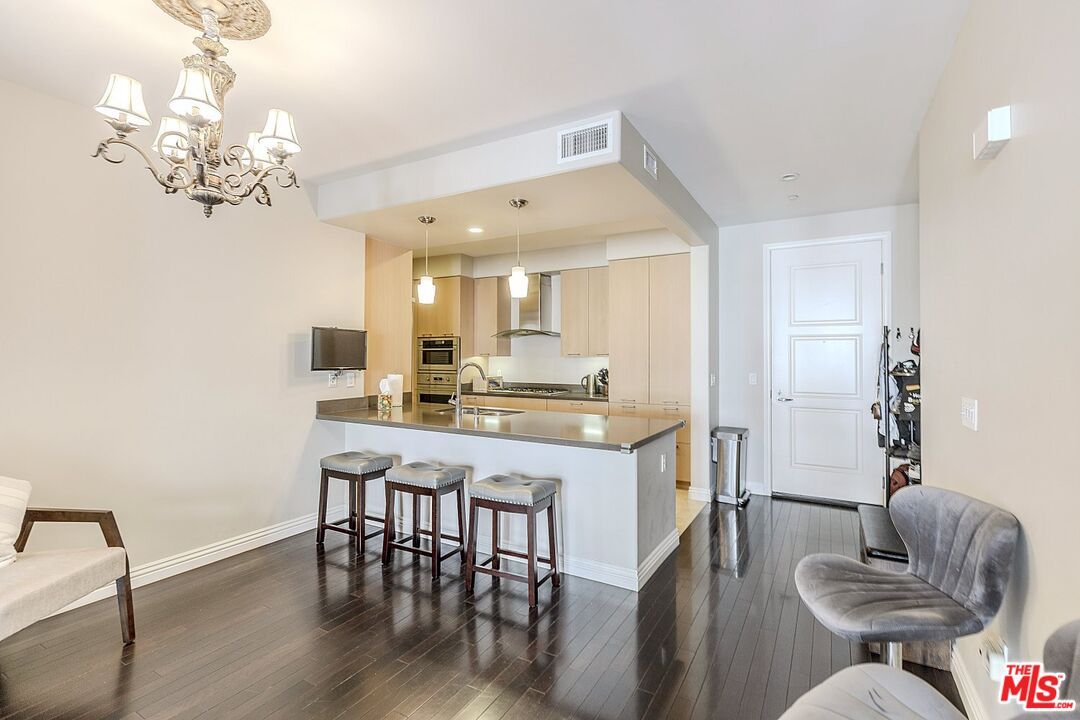 Chandelier, Interior, Kitchen, Pendant Lights, Recessed Lighting, Stainless Steel Appliances, Wood Texture Flooring