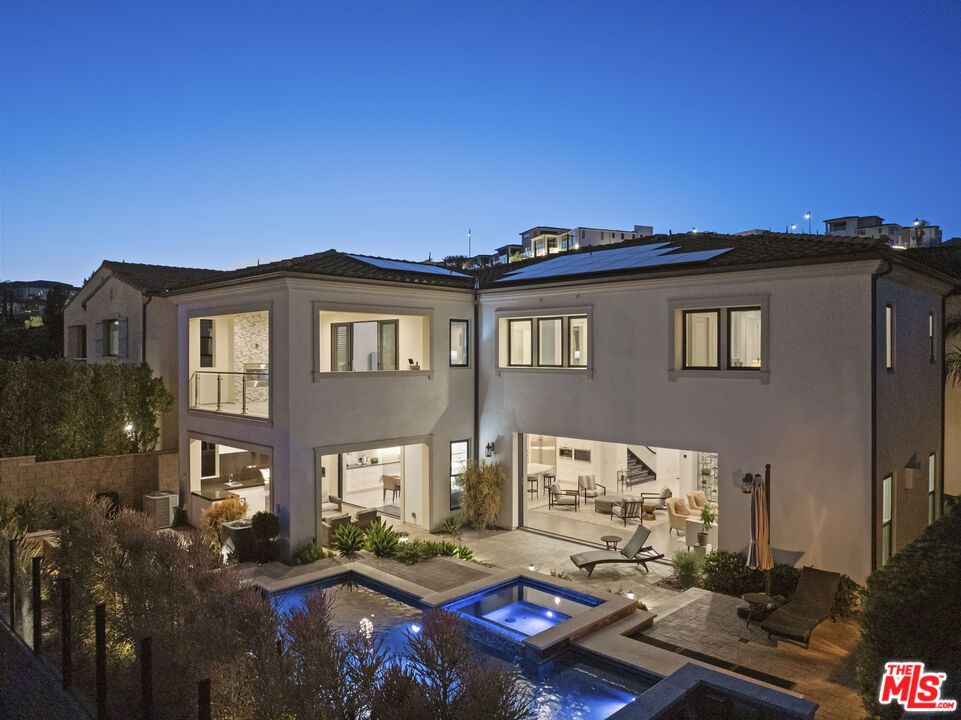 Exterior, Pool, Solar Panels