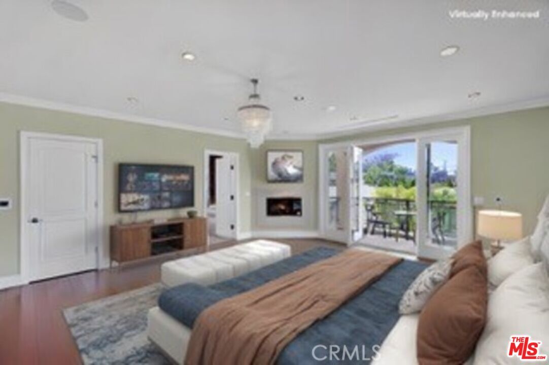 Bedroom, Chandelier, Fireplace, Interior, Recessed Lighting, Wood Texture Flooring