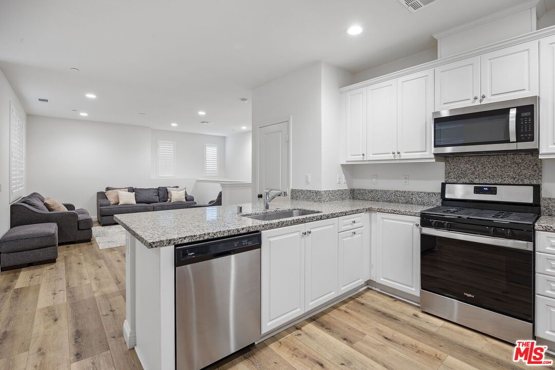 Interior, Kitchen, Living room, Recessed Lighting, Stainless Steel Appliances, Wood Texture Flooring