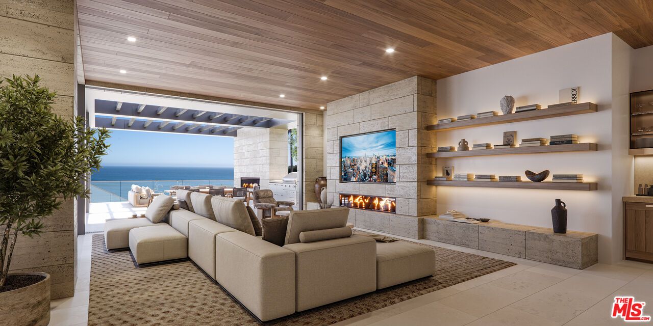 Fireplace, Interior, Living room, Recessed Lighting, Stone Walls, Water, Wooden Ceilings