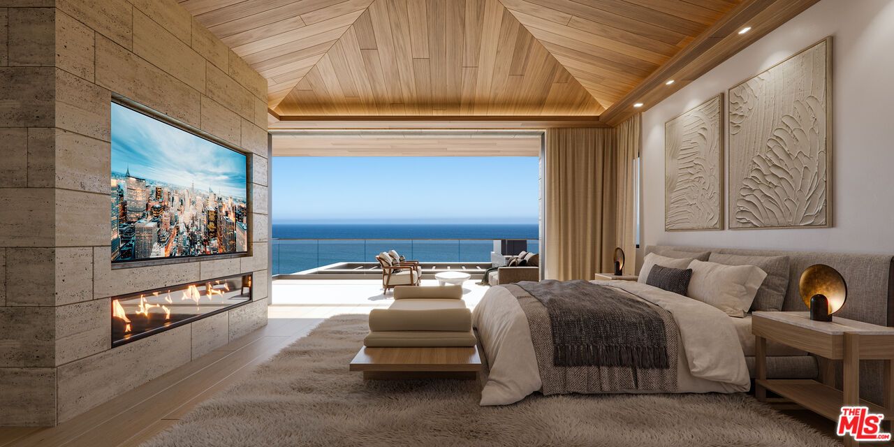 Bedroom, Fireplace, Interior, Recessed Lighting, Stone Walls, Water, Wooden Ceilings