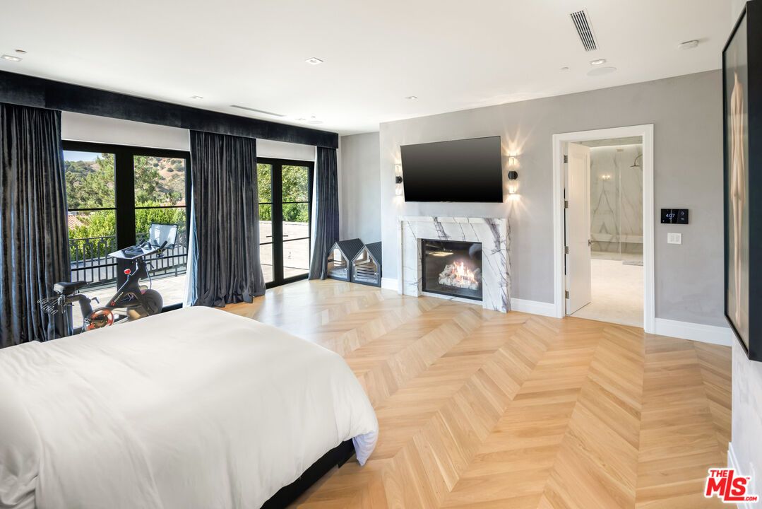 Bedroom, Fireplace, Fitness Equipment, Interior, Recessed Lighting, Wood Texture Flooring