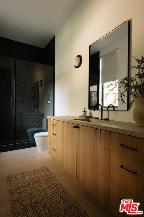 Bathroom, Dual Sink Vanities, Glass Shower, Interior, Wood Texture Flooring