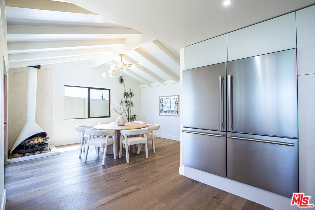 Dining room, Fireplace, Interior, Kitchen, Recessed Lighting, Wood Texture Flooring