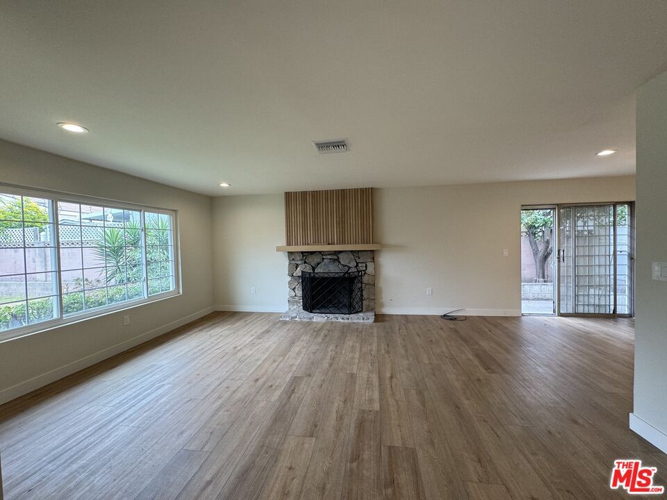 Empty room, Fireplace, Interior, Recessed Lighting, Wood Texture Flooring