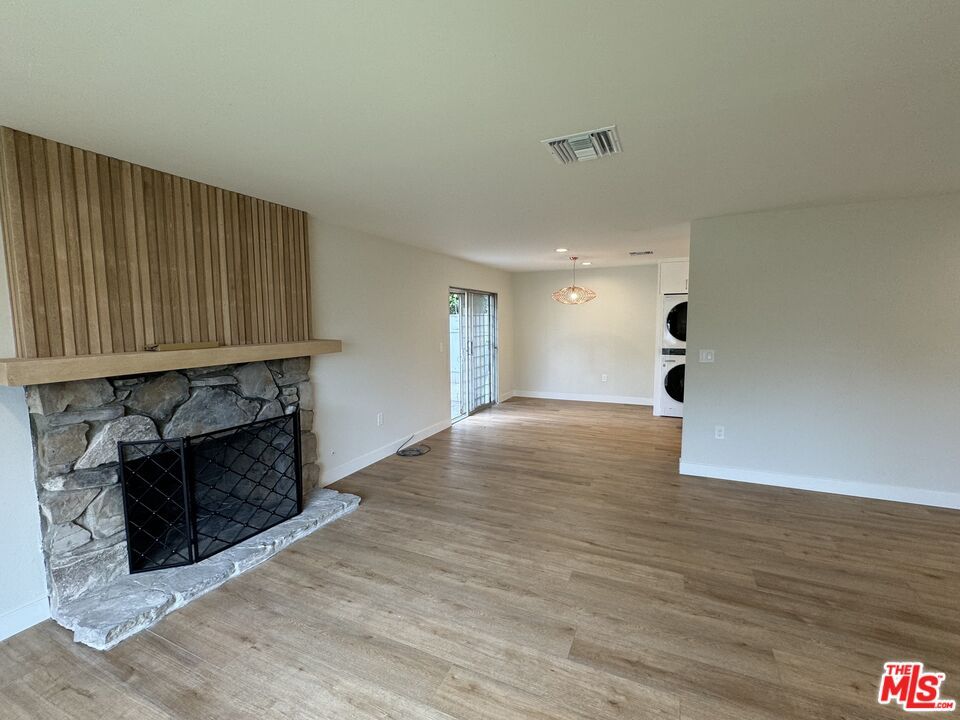 Empty room, Fireplace, Interior, Pendant Lights, Wood Texture Flooring