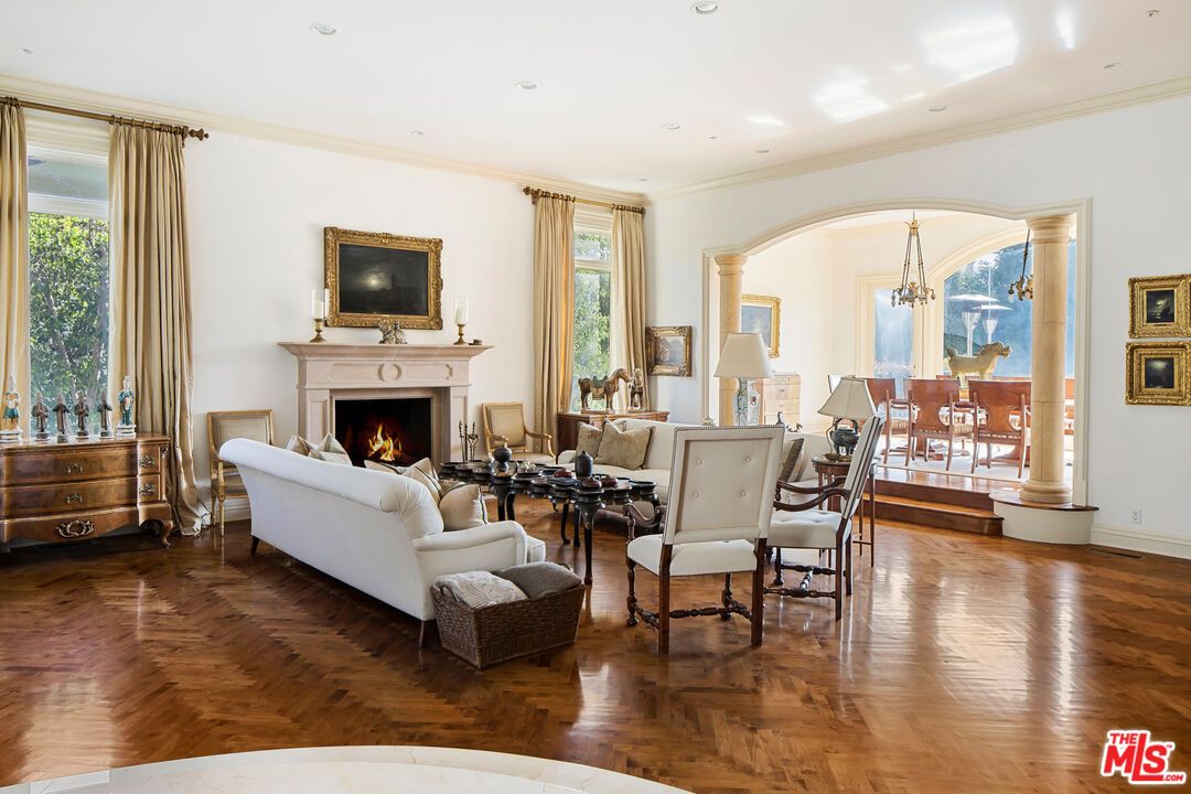 Dining room, Fireplace, Interior, Living room, Recessed Lighting, Wood Texture Flooring