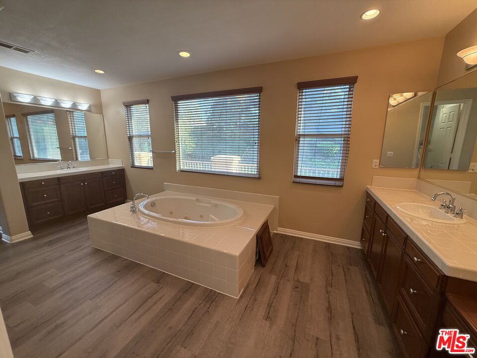 Bathroom, Dual Sink Vanities, Interior, Recessed Lighting, Tile Countertops, Wood Texture Flooring