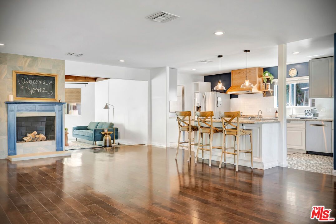 Fireplace, Interior, Kitchen, Pendant Lights, Recessed Lighting, Wood Texture Flooring