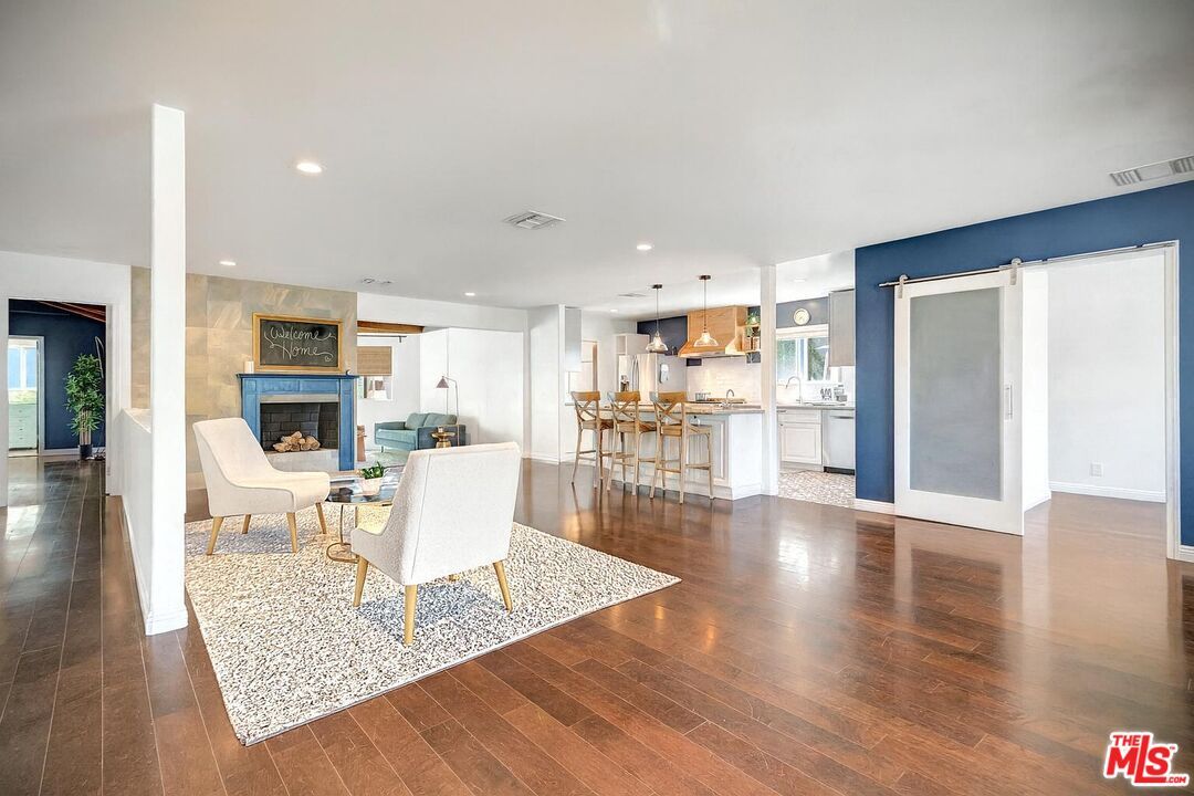 Dining room, Fireplace, Interior, Kitchen, Living room, Pendant Lights, Recessed Lighting, Wood Texture Flooring