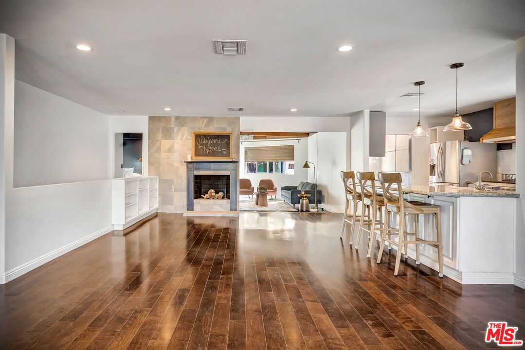 Fireplace, Interior, Pendant Lights, Recessed Lighting, Wood Texture Flooring