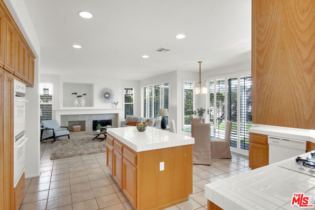 Dining room, Fireplace, Interior, Kitchen, Pendant Lights, Recessed Lighting, Tile Countertops