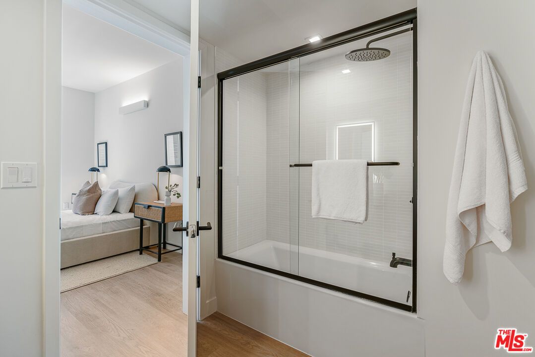 Bathroom, Bedroom, Glass Shower, Interior, Recessed Lighting, Wood Texture Flooring