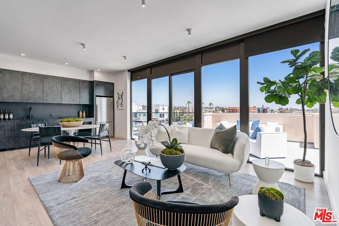 Dining room, Interior, Kitchen, Living room, Recessed Lighting, Stainless Steel Appliances, Wood Texture Flooring