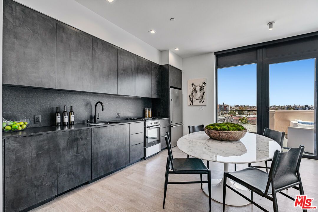 Dining room, Interior, Kitchen, Recessed Lighting, Stainless Steel Appliances, Wood Texture Flooring