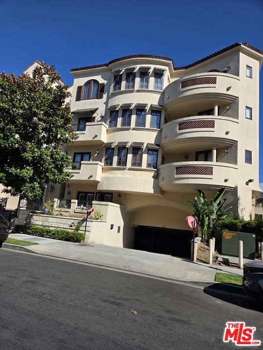 Attached, Exterior, Facade, Condo Building
