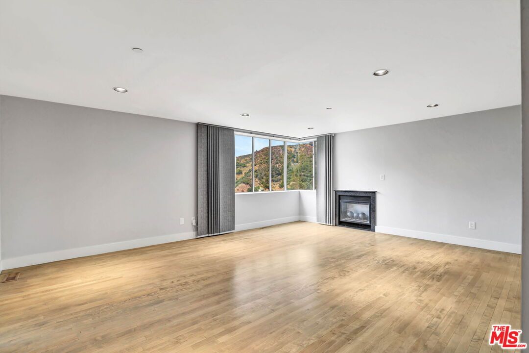 Empty room, Fireplace, Interior, Recessed Lighting, Wood Texture Flooring