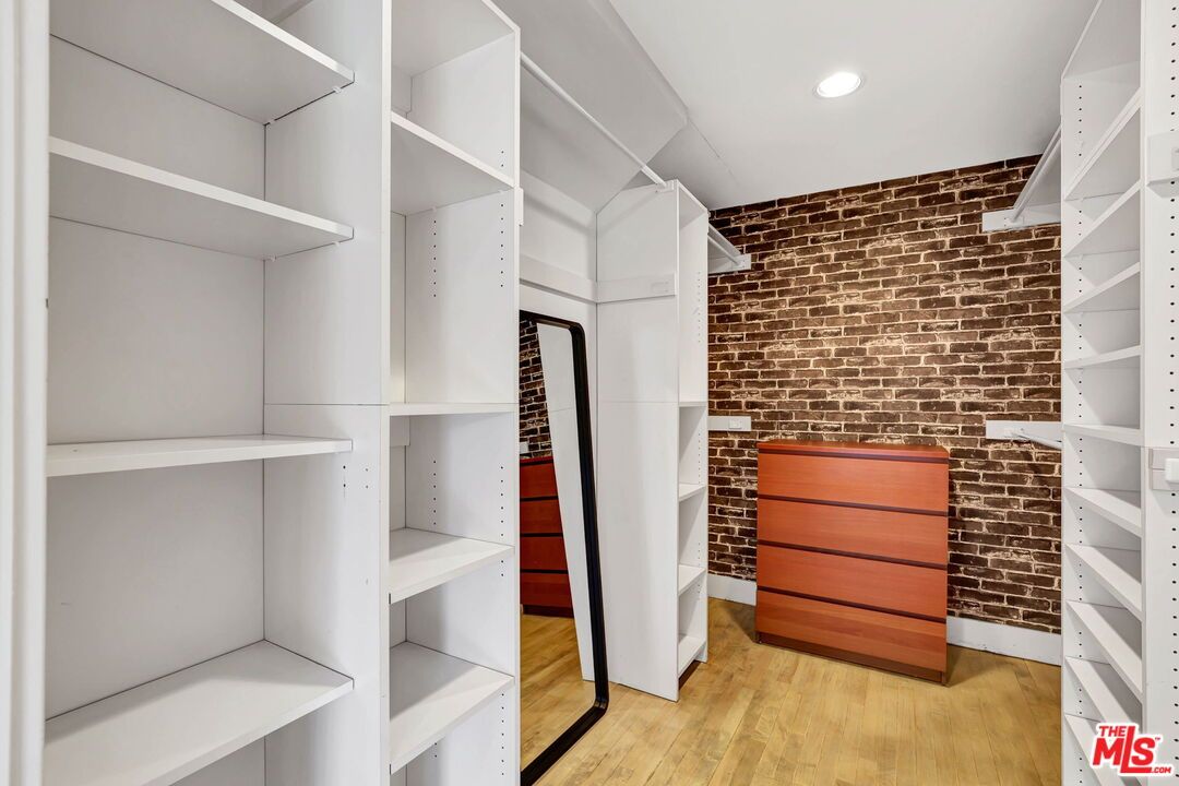 Interior, Recessed Lighting, Stone Walls, Walk-in Closets, Wood Texture Flooring