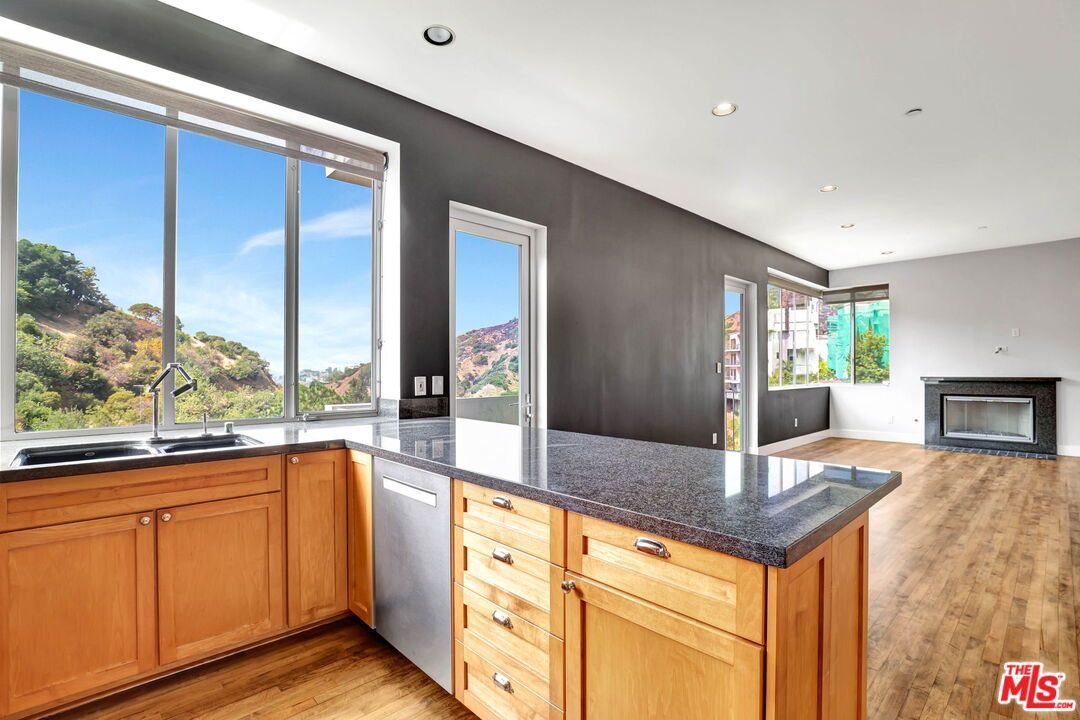 Fireplace, Interior, Kitchen, Recessed Lighting, Wood Texture Flooring