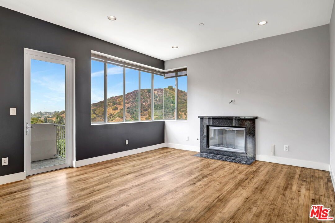 Empty room, Fireplace, Interior, Recessed Lighting, Wood Texture Flooring