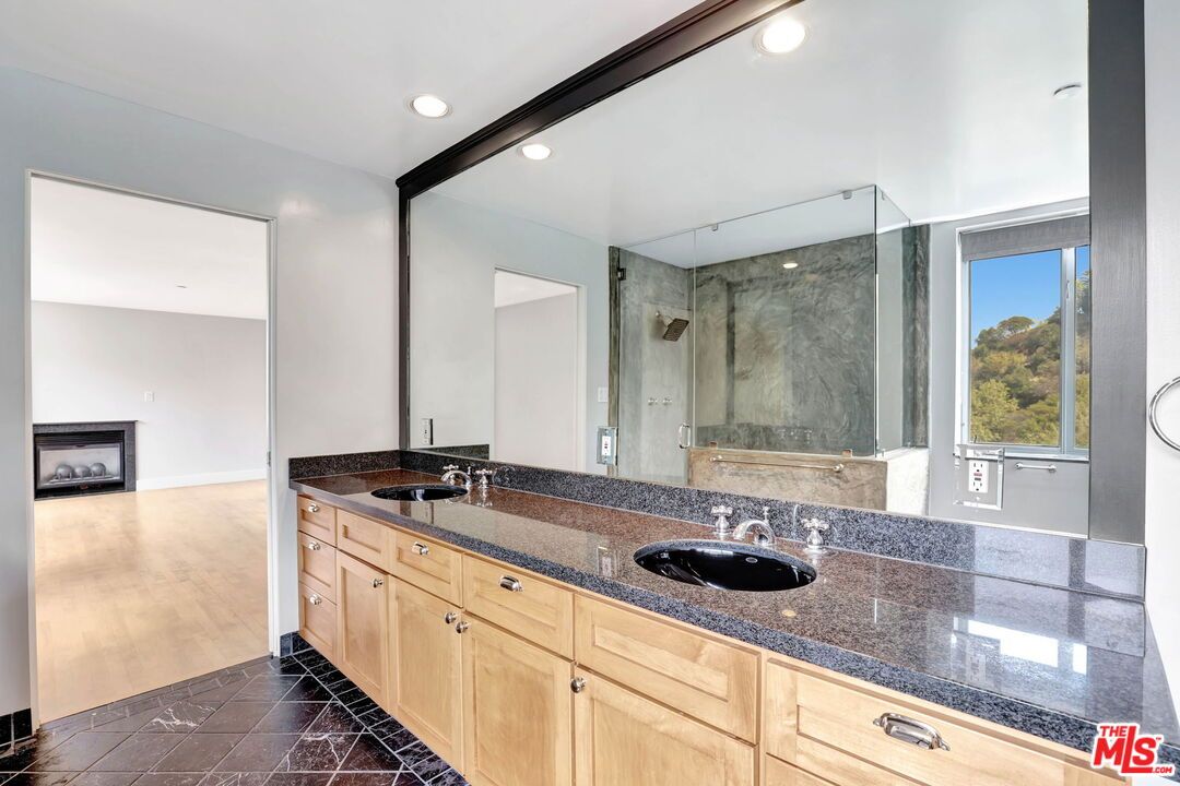 Bathroom, Dual Sink Vanities, Glass Shower, Interior, Recessed Lighting, Wood Texture Flooring