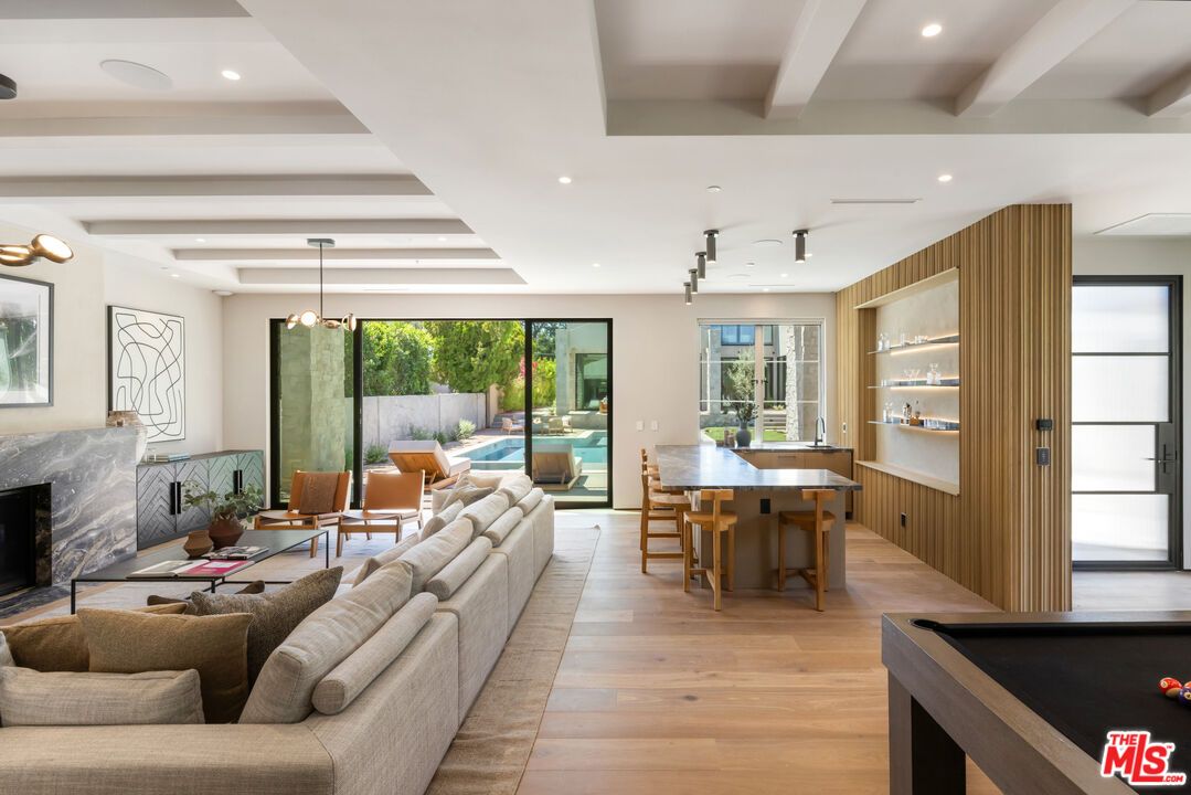 Dining room, Fireplace, Interior, Living room, Pendant Lights, Recessed Lighting, Wood Texture Flooring
