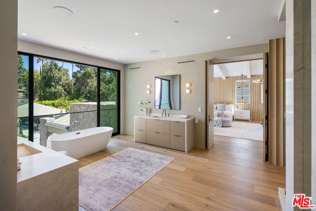 Bathroom, Dual Sink Vanities, Free Standing Baths, Interior, Recessed Lighting, Wood Texture Flooring