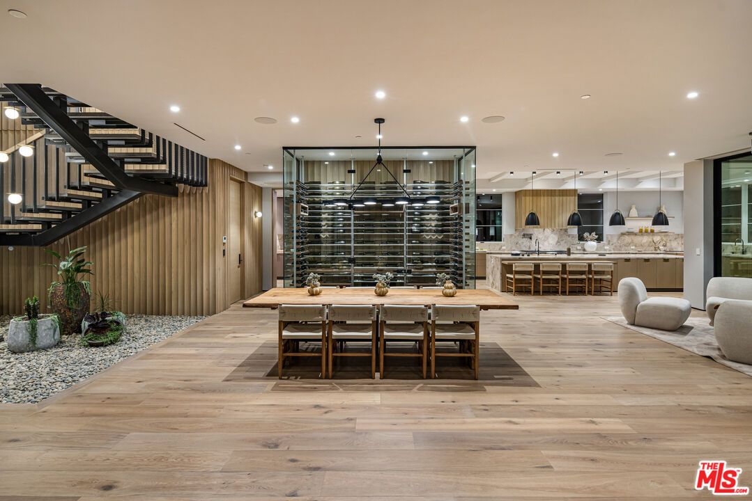 Interior, Kitchen, Pendant Lights, Recessed Lighting, Stainless Steel Appliances, Wine Storage, Wood Texture Flooring