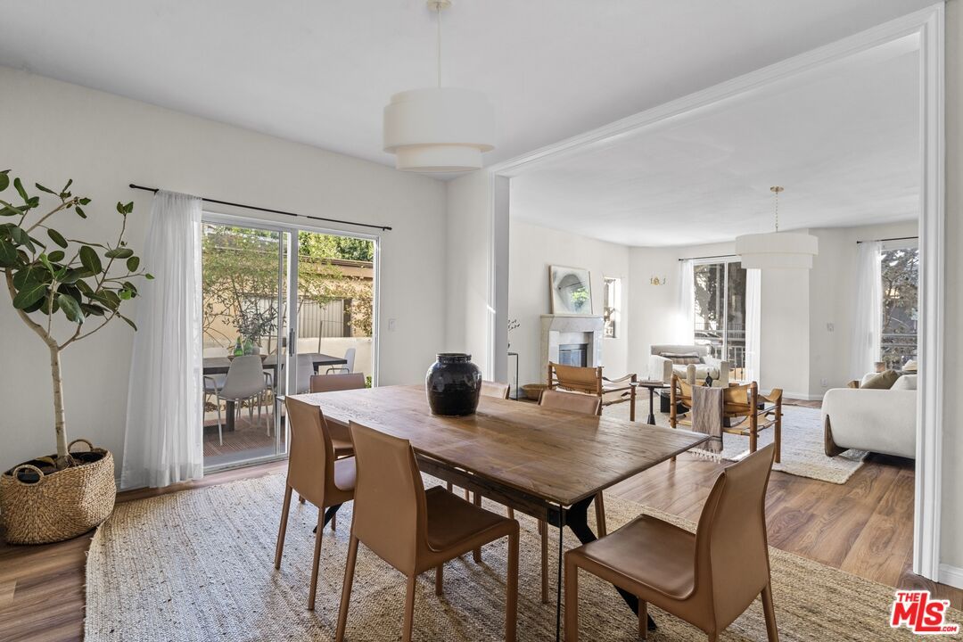 Dining room, Fireplace, Interior, Living room, Pendant Lights, Wood Texture Flooring