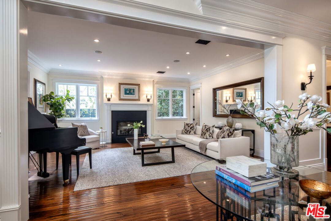 Fireplace, Interior, Living room, Piano, Recessed Lighting, Wood Texture Flooring