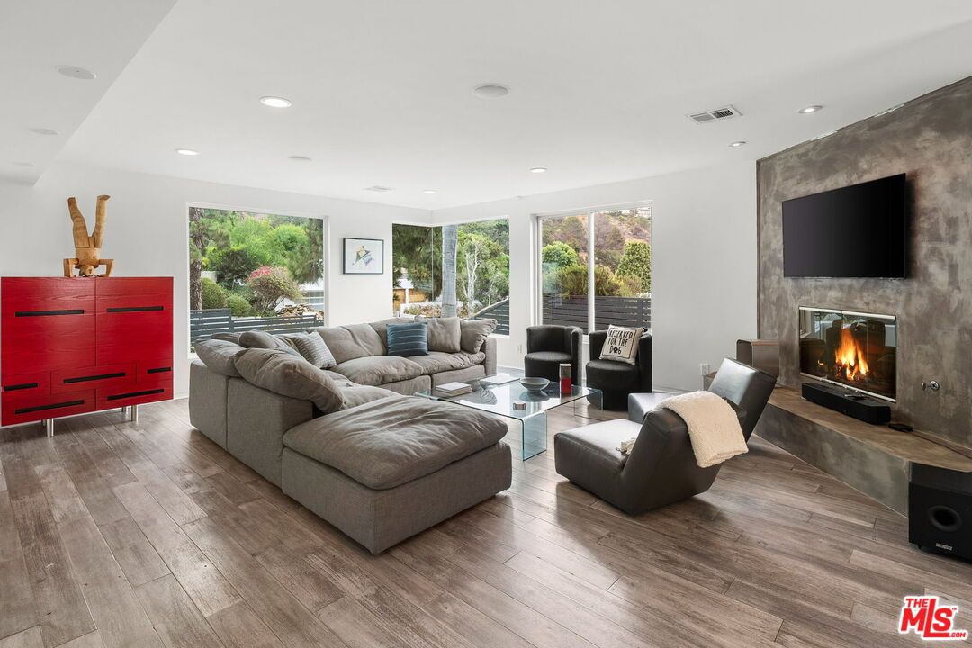 Fireplace, Interior, Living room, Recessed Lighting, Wood Texture Flooring