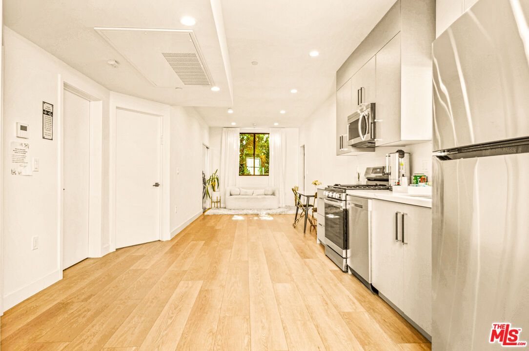 Interior, Kitchen, Recessed Lighting, Stainless Steel Appliances, Wood Texture Flooring
