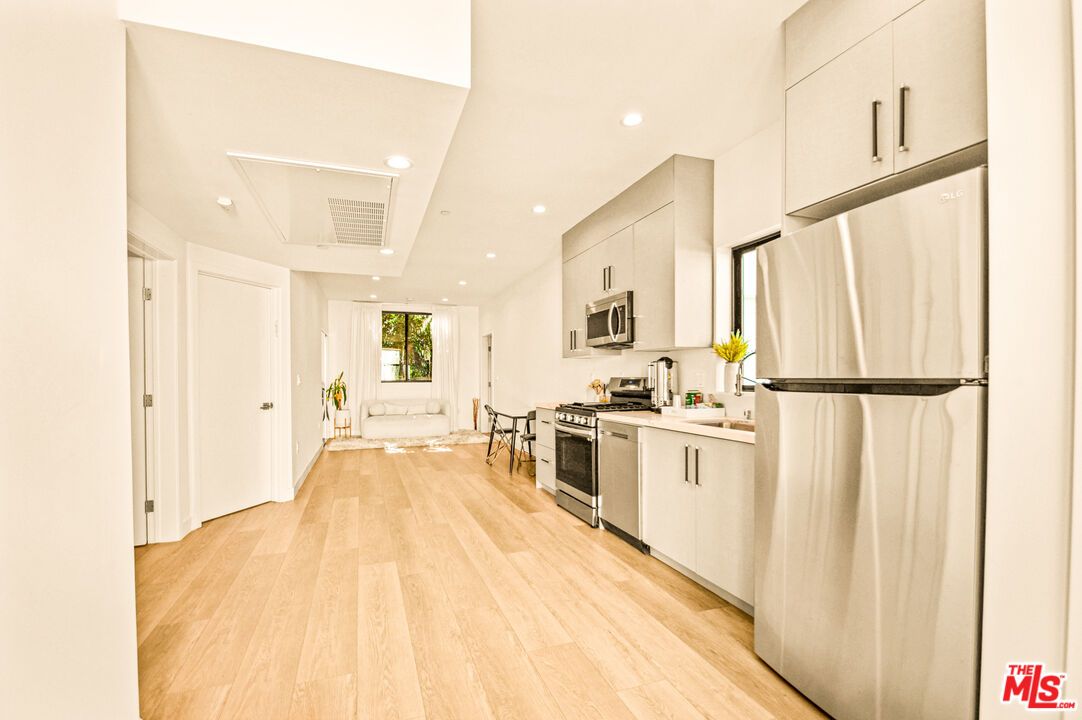 Interior, Kitchen, Recessed Lighting, Stainless Steel Appliances, Wood Texture Flooring