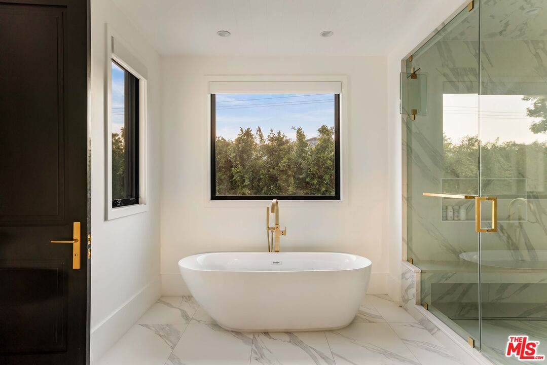 Bathroom, Free Standing Baths, Glass Shower, Interior, Marble, Marble Walls, Recessed Lighting