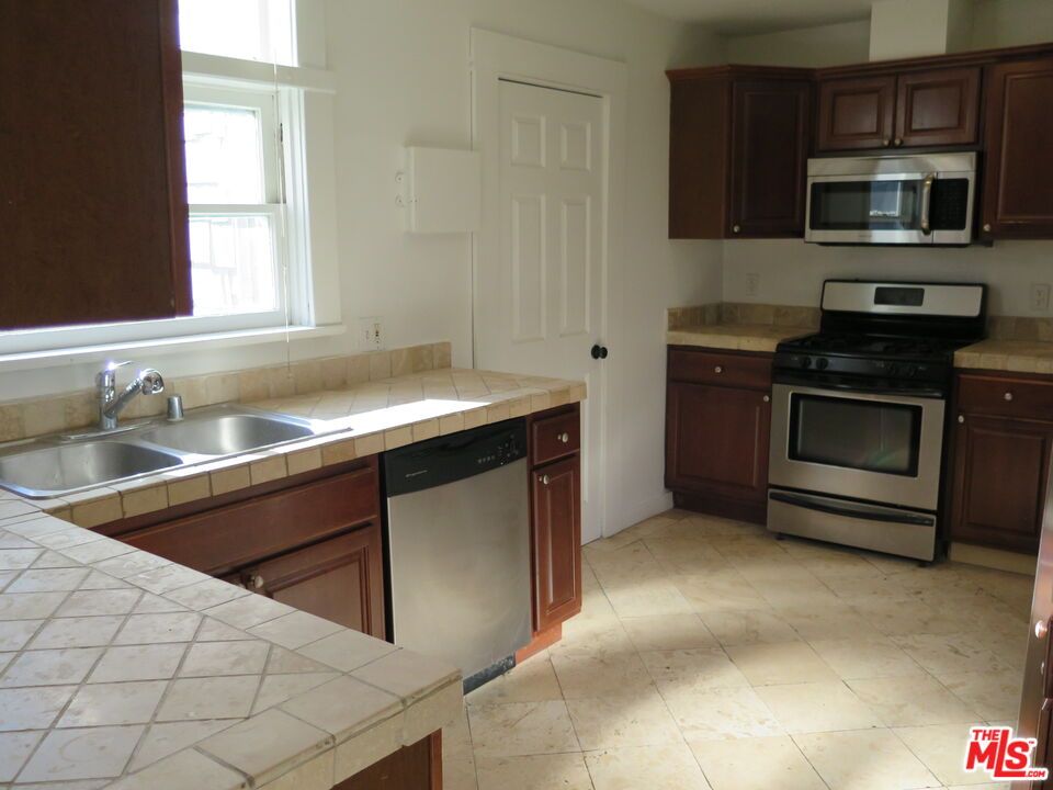 Interior, Kitchen, Stainless Steel Appliances, Tile Countertops
