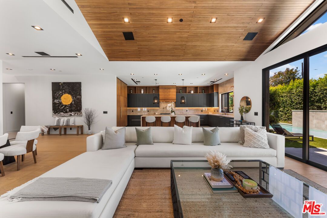 Dining room, Interior, Kitchen, Living room, Pendant Lights, Recessed Lighting, Stainless Steel Appliances, Wooden Ceilings, Wood Texture Flooring