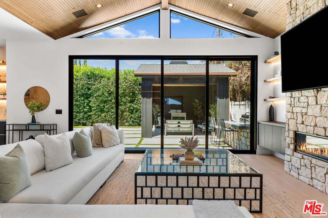 Fireplace, Interior, Living room, Recessed Lighting, Stone Walls, Wooden Ceilings, Wood Texture Flooring