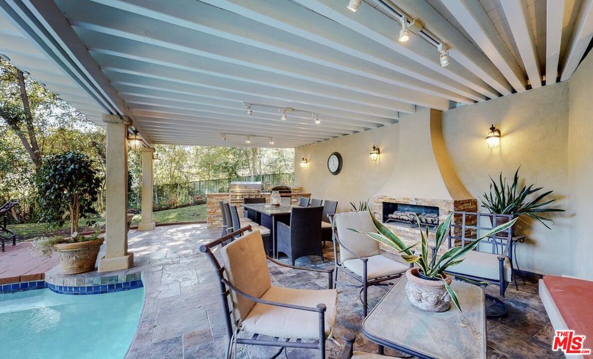 Exterior, Fireplace, Pool