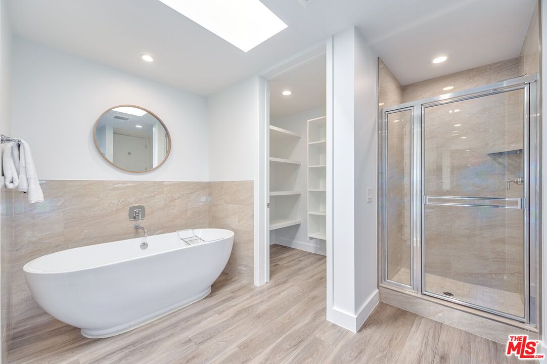 Bathroom, Free Standing Baths, Glass Shower, Interior, Recessed Lighting, Walk-in Closets, Wood Texture Flooring