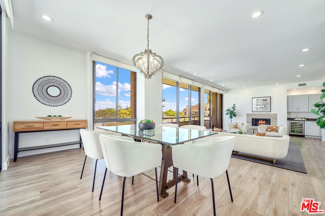 Dining room, Fireplace, Interior, Living room, Pendant Lights, Recessed Lighting, Wood Texture Flooring