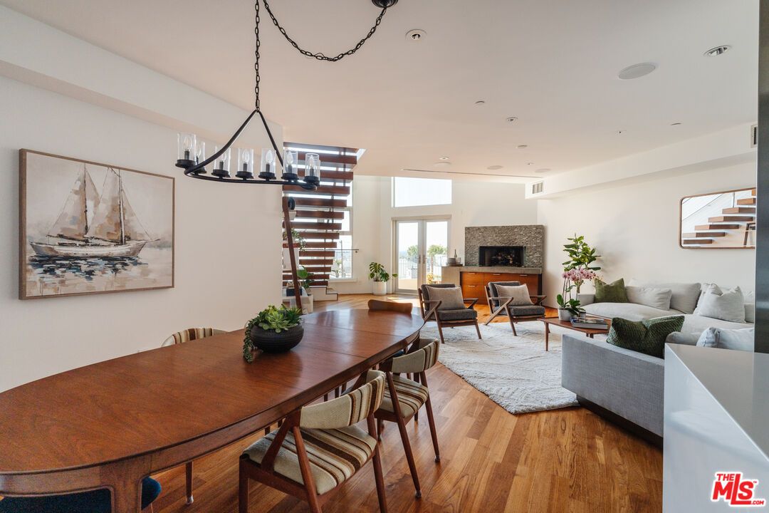 Chandelier, Dining room, Fireplace, Interior, Living room, Recessed Lighting, Wood Texture Flooring