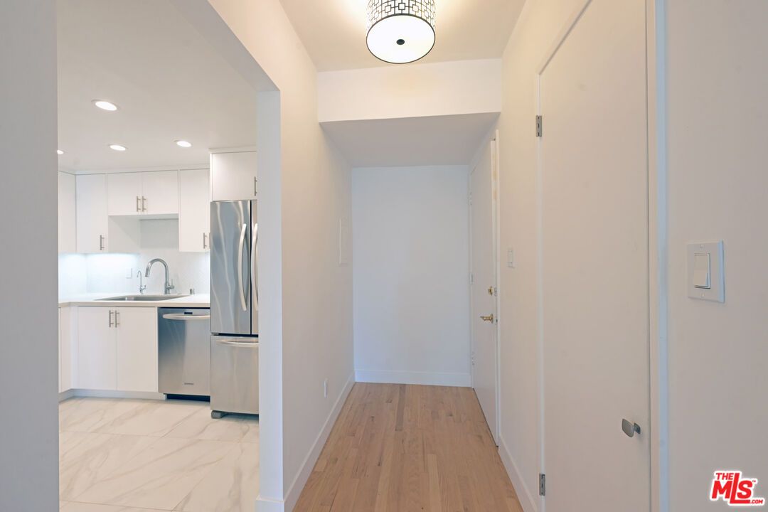Interior, Kitchen, Marble, Recessed Lighting, Stainless Steel Appliances, Wood Texture Flooring