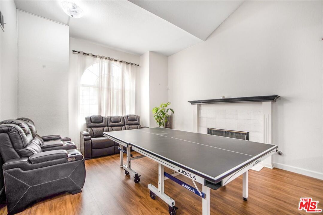 Fireplace, Game Room, Interior, Living room, Wood Texture Flooring