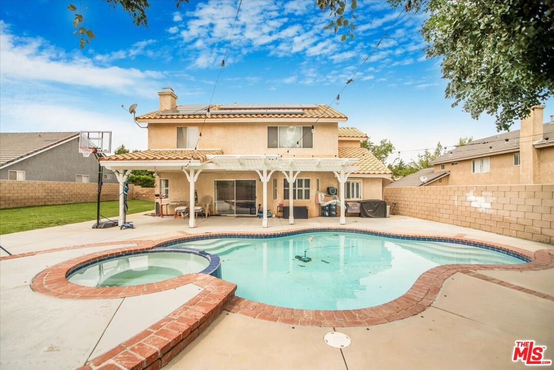 Exterior, Pool, Solar Panels