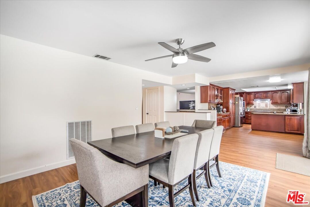 Dining room, Interior, Kitchen, Recessed Lighting, Stainless Steel Appliances, Wood Texture Flooring