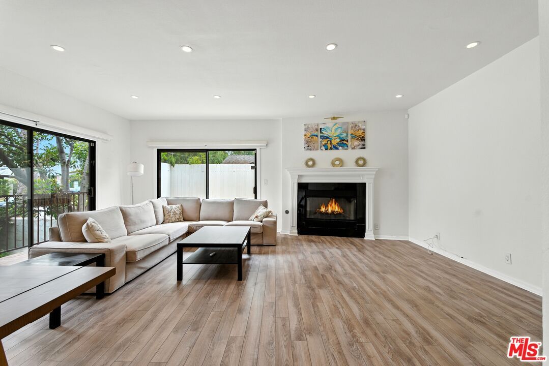 Fireplace, Interior, Living room, Recessed Lighting, Wood Texture Flooring