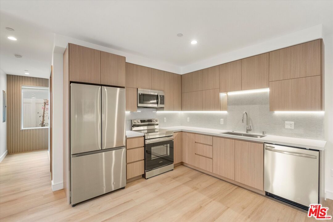 Interior, Kitchen, Recessed Lighting, Stainless Steel Appliances, Wood Texture Flooring