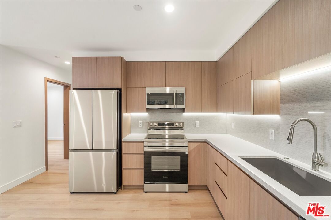 Interior, Kitchen, Recessed Lighting, Stainless Steel Appliances, Wood Texture Flooring