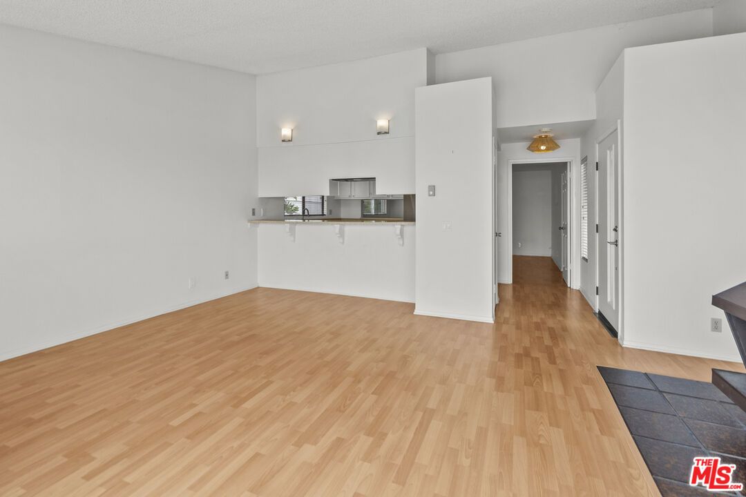 Empty room, Interior, Kitchen, Stainless Steel Appliances, Wood Texture Flooring